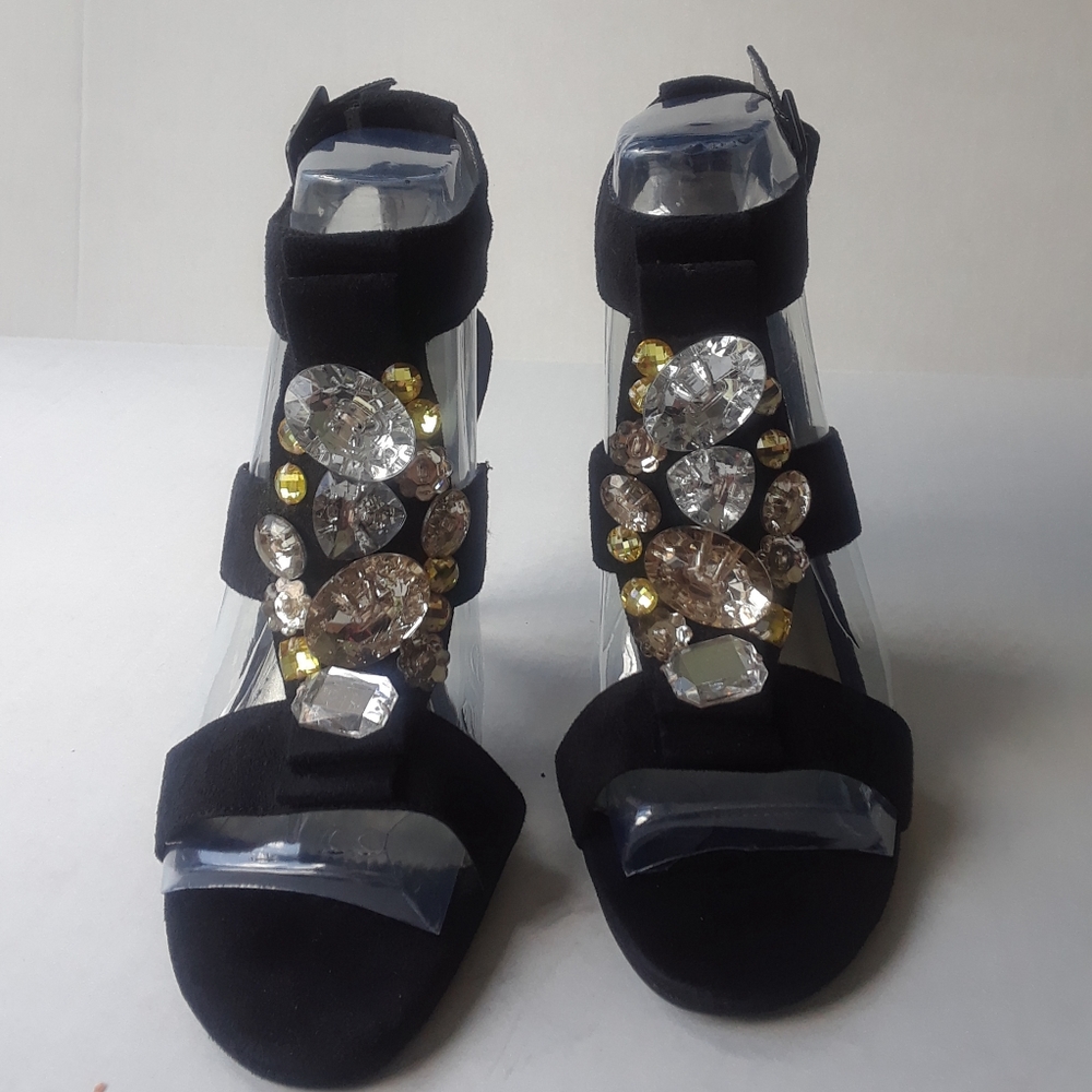 Black suede heels with jewels.